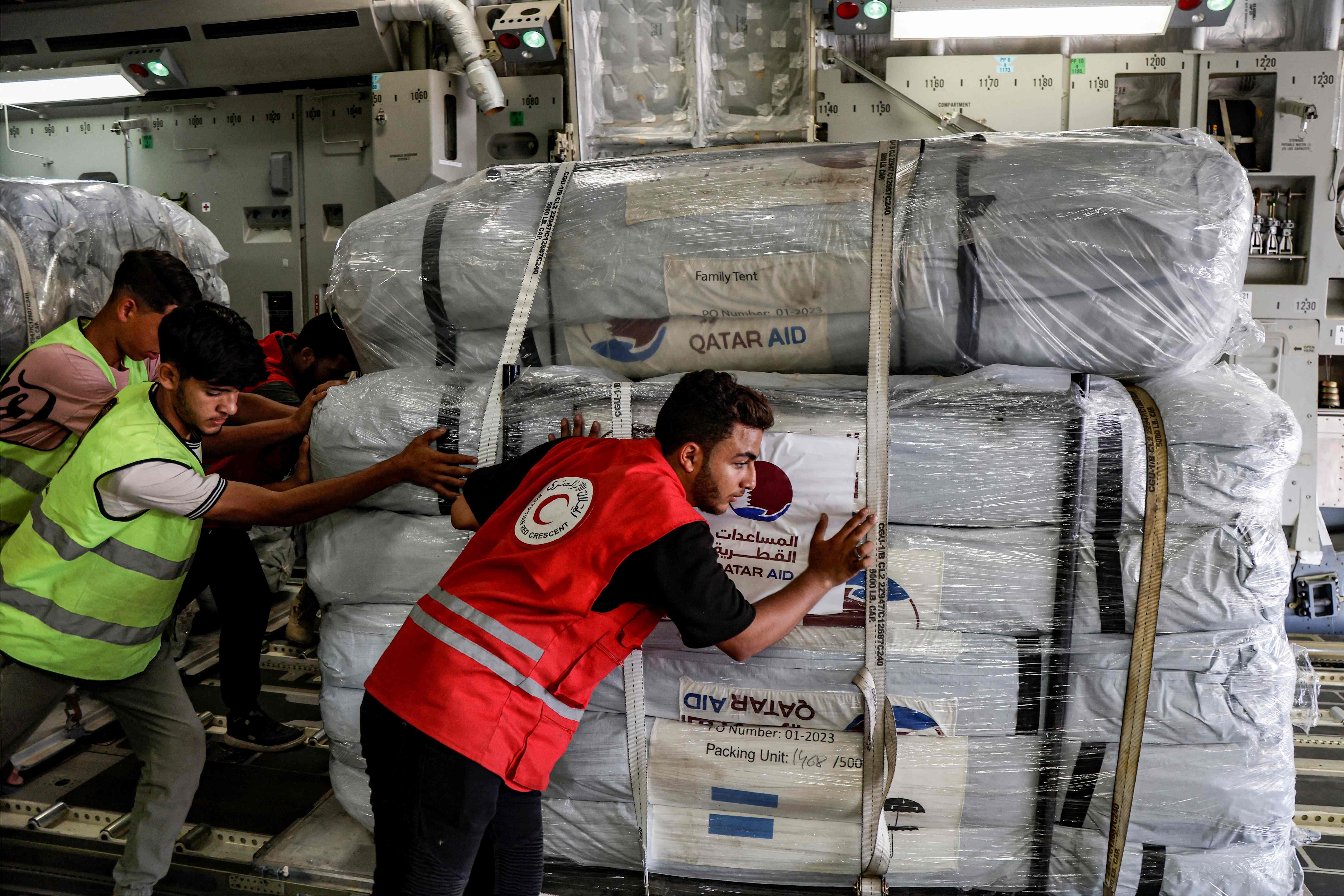 The first US military plane arrived in Egypt to carry 24.5 metric tons of Gaza aid.